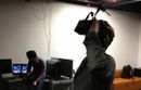A man uses VR goggles.
